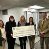Pictured, from left, are Sharon Pate, teller manager, Cheri Coin, regional coordinator for The Food Bank, Stephanie Baker, loan officer, Stacy Quinn, assistant principal of Macon R-I School and Steve Kempker, senior vice president.