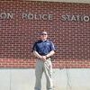 Adam Dawdy pictured in front of the Macon City Police Station