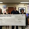 Midwest Bone &amp; Joint Center staff present Kala Bunse, Principal of Tri-County Christian School a check to fund promethean boards for classrooms. Pictured (left to right): Denise Bennet, Marketing Director; Teresa Grimshaw, Business Manager; Dr. Chris Main; Kala Bunse, Principal. (Photo/Shon Coram).
