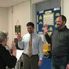 Dr. Brandon Mack and Mr. Jason Robinson being sworn in as new members of the Board of Education